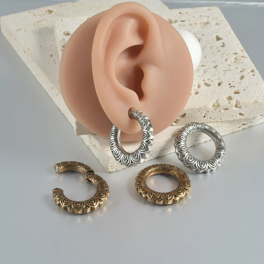Geometric hollow-out earrings with antique silver dragon finish in copper auricle style