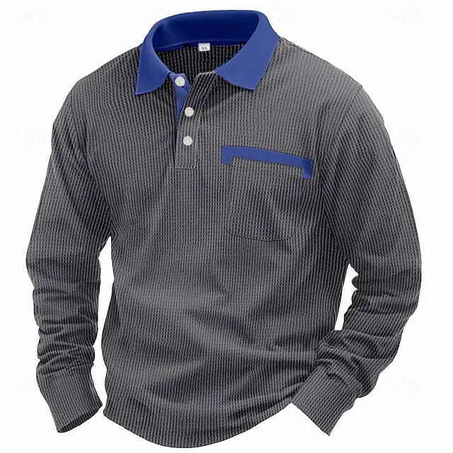 Man wearing a long-sleeved waffle texture polo shirt in a loose fit, showcasing the asymmetric detail.