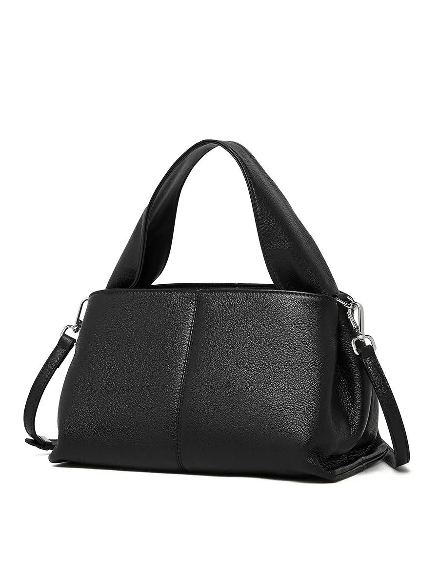 Women's genuine leather messenger bag in horizontal square shape with double shoulder strap, shown in apricot colour.