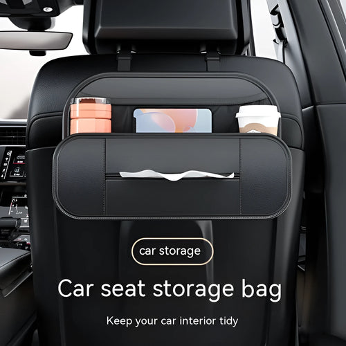 Black leather car seat rear storage bag hanging behind a vehicle seat.