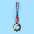 Braided rope dog tug toy measuring 43 cm long in blue colour with knotted design