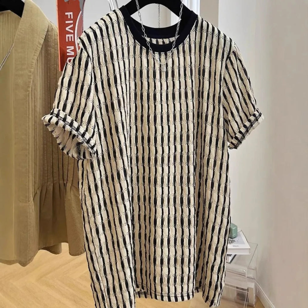 Black striped men's loose fit casual short sleeve pullover shirt on a hanger.
