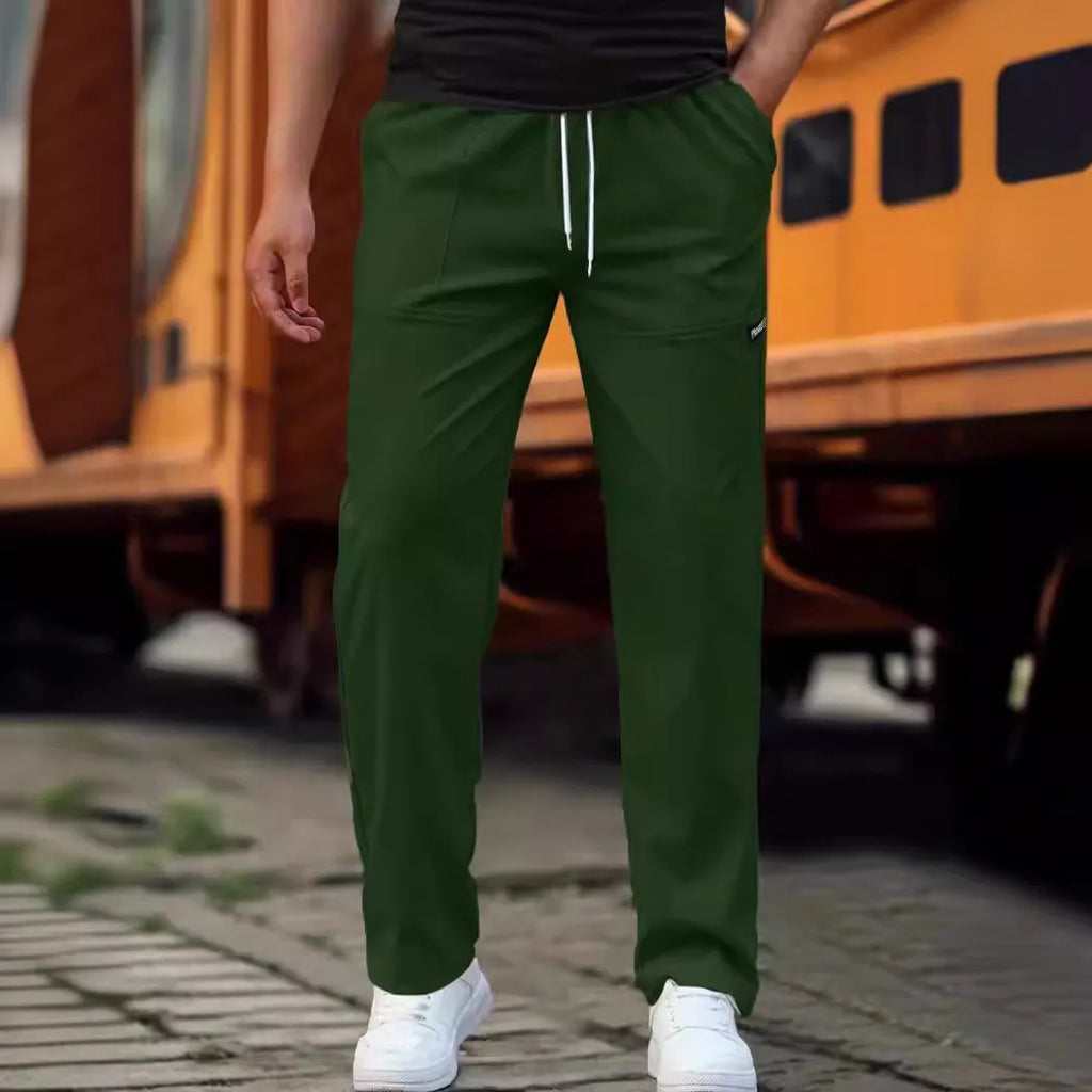 Men's light grey polyester trousers for spring and autumn casual wear, shown in Asian sizing.