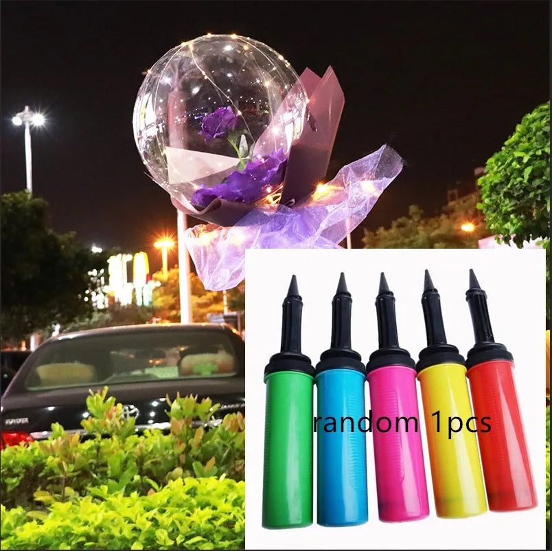 Transparent LED luminous balloon bouquet with artificial rose and glowing light inside, displayed as a DIY kit.
