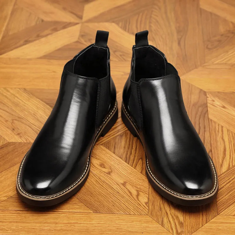 Men's black formal pointed-toe leather boots with a square heel on a white background
