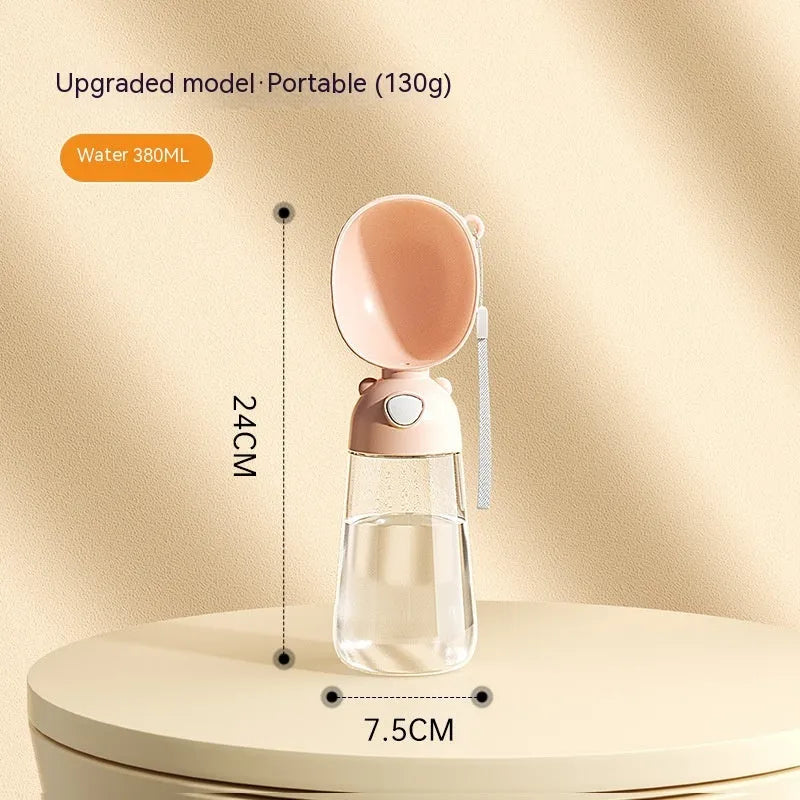 Portable dog water bottle with integrated food container in brown, pink, or yellow colours