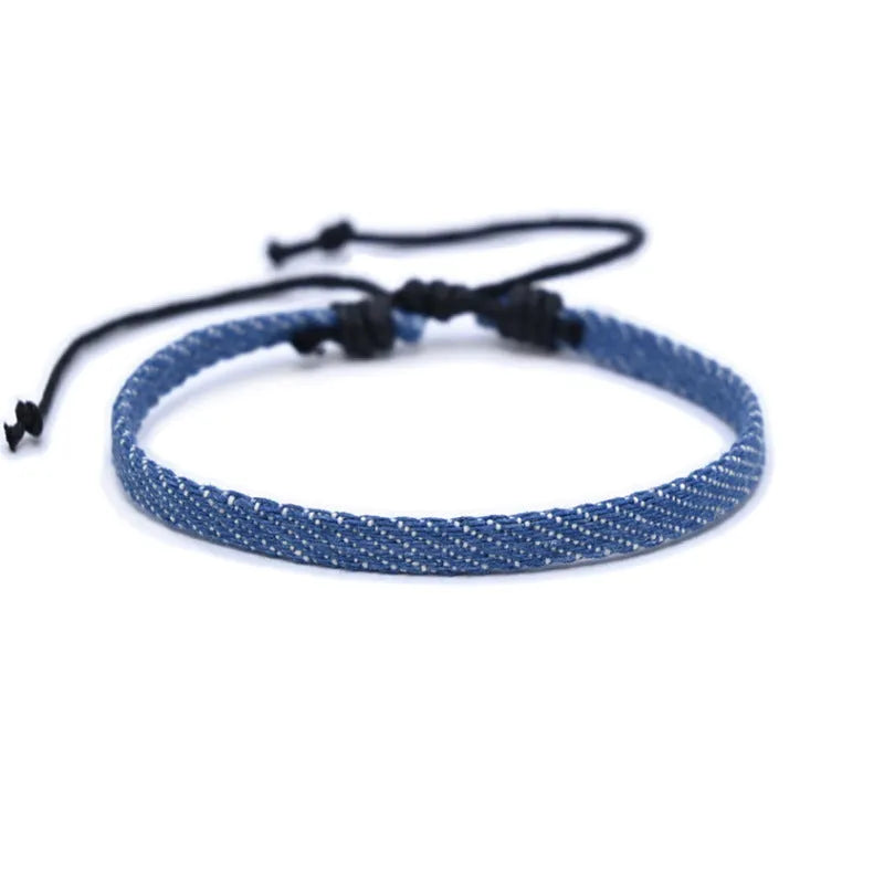 Handmade denim fabric bracelet strap for travel memories, shown in one of eleven colour variants