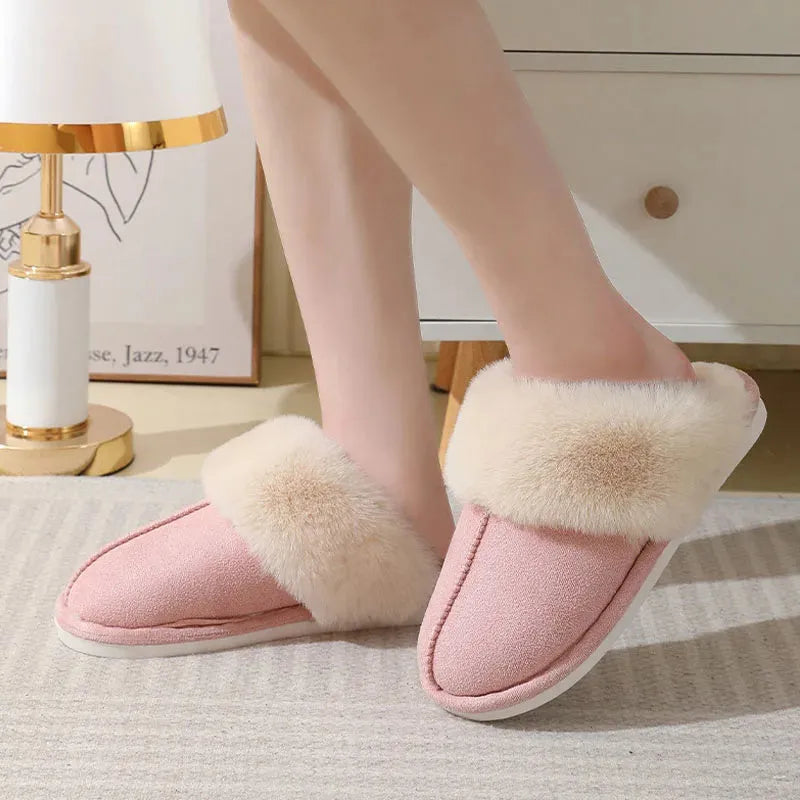 Women's winter plush slippers with round toe design in brown colour showing stitching detail