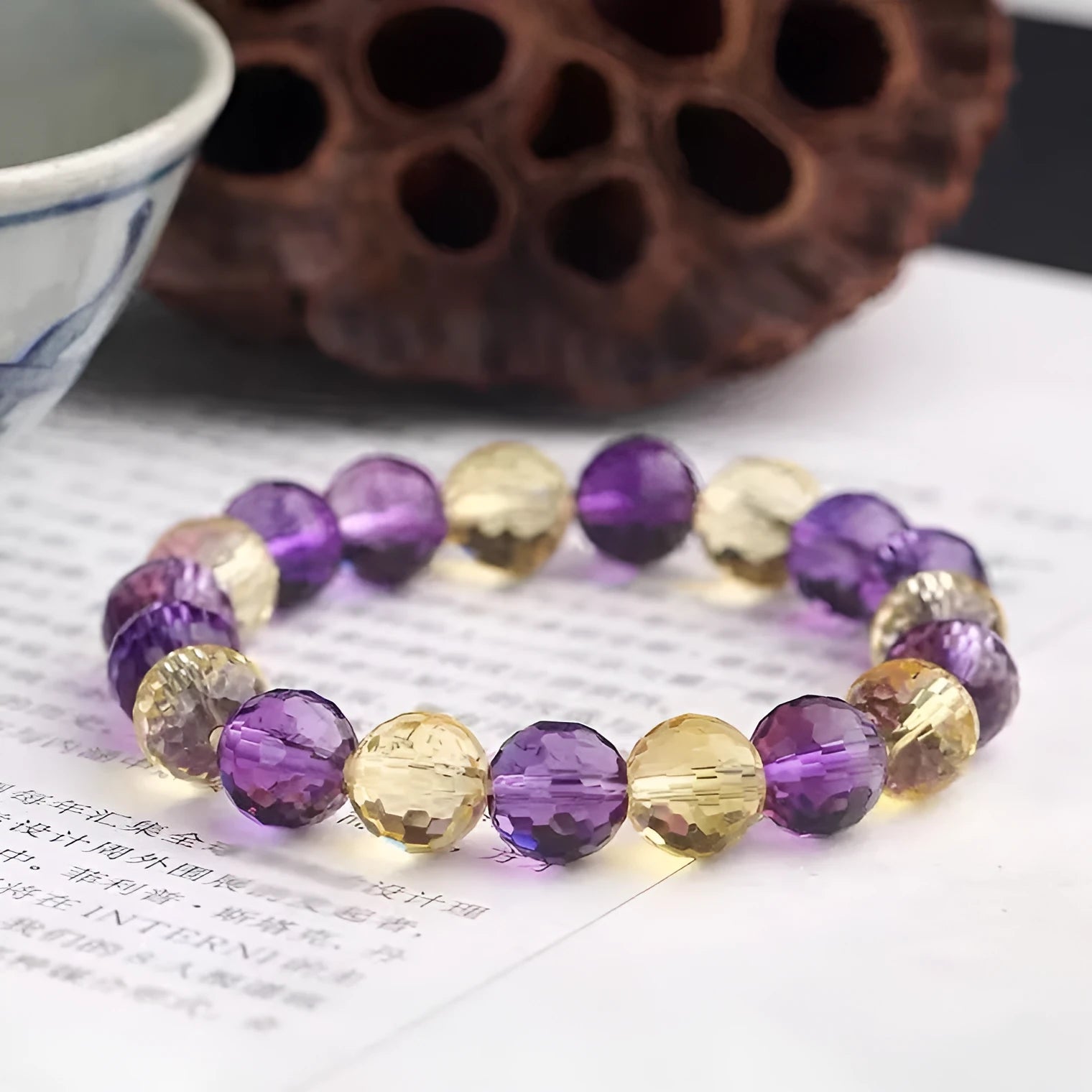 128-cut crystal bracelet showing detailed facet reflection on Amethyst, Ametrine or Citrine beads