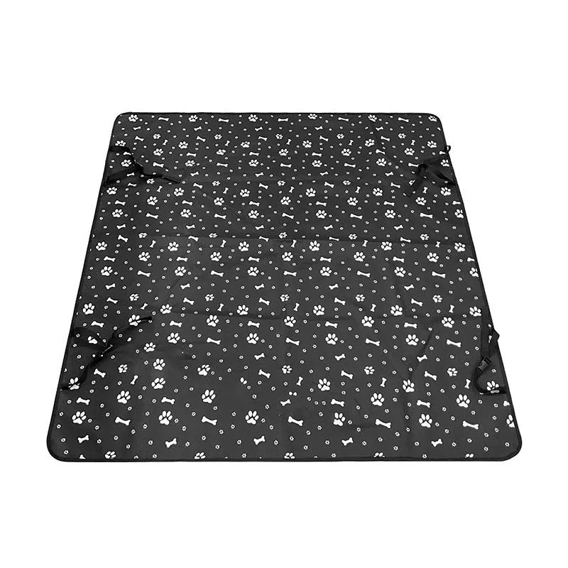 Grey car pet mat with dog bone print on rear car seat protecting upholstery