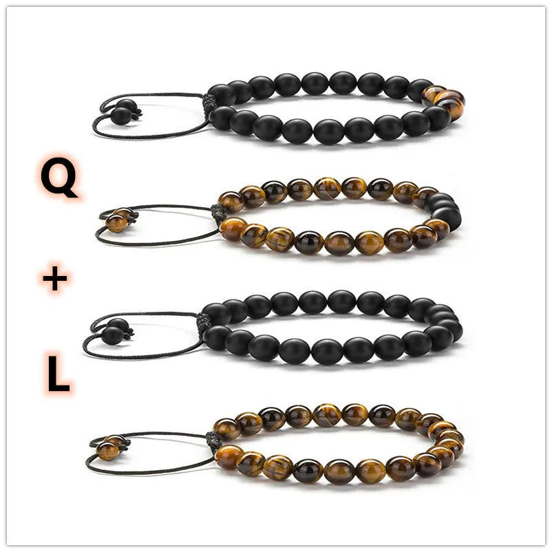 Geometric couple bracelet made of matte black agate beads with a tiger eye stone.