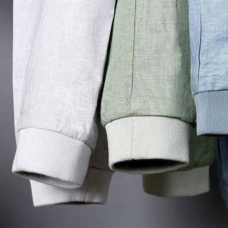 Men's thin blue cotton linen jacket in regular fit on a hanger.