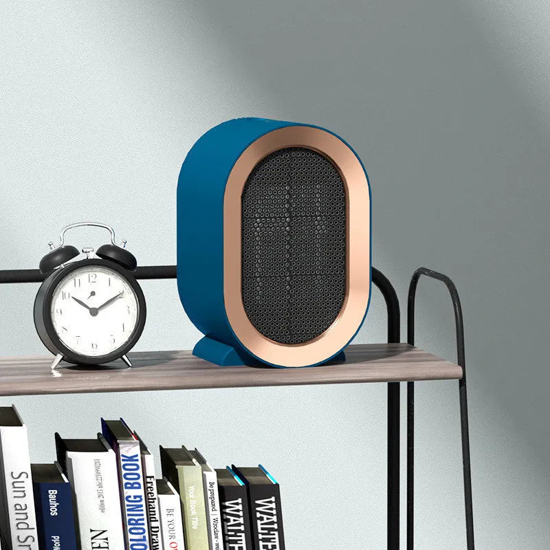 Desktop electric ceramic fan heater in black finish with mechanical controls