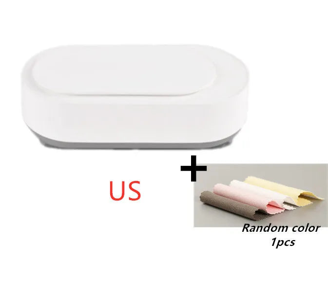 White portable ultrasonic cleaning machine with a stainless steel tank for jewellery and glasses.