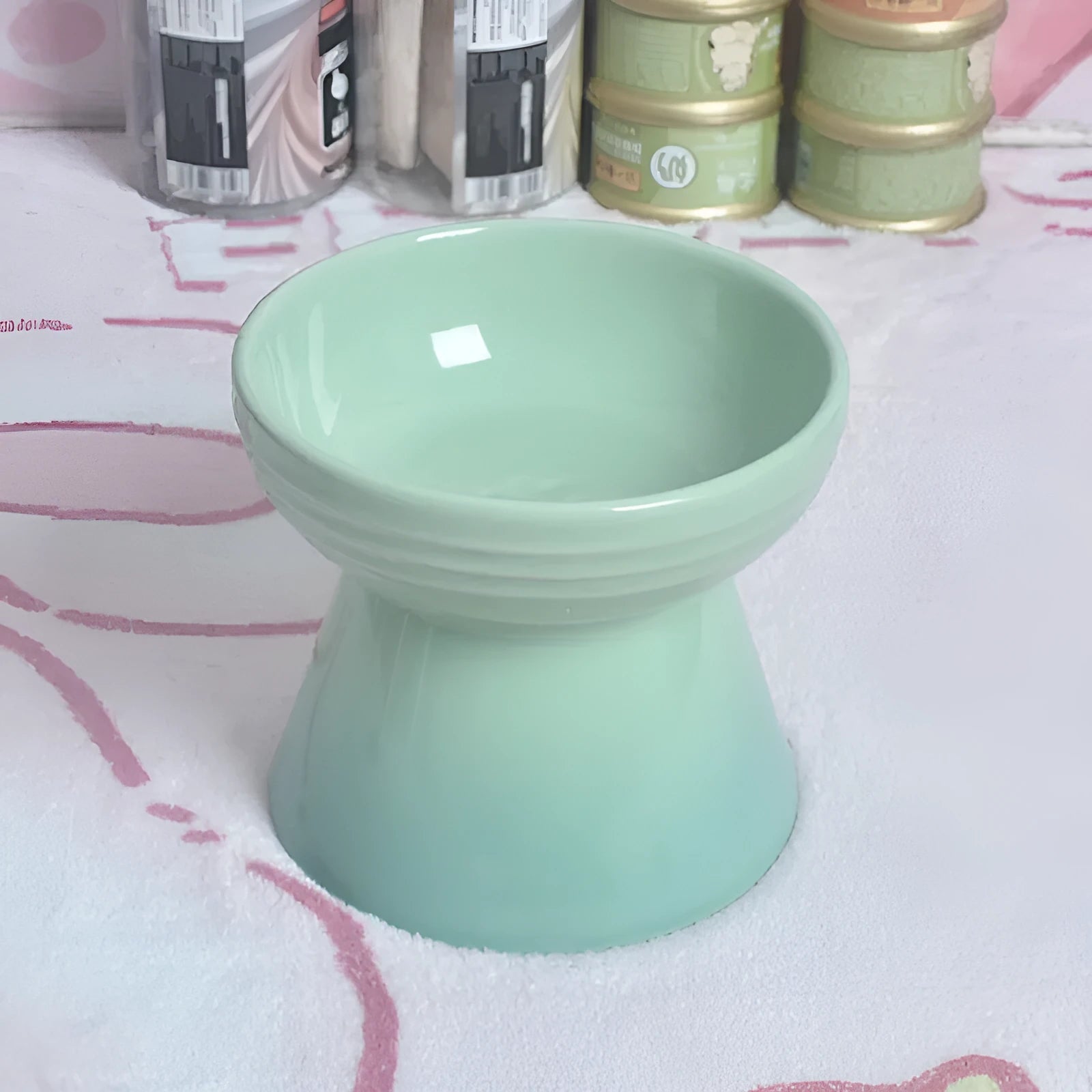 Ceramic pet bowl with anti-tumble design and raised chin support for cats and dogs