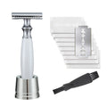 Copper safety razor with olive wood handle next to aluminium alloy blade holder and blades
