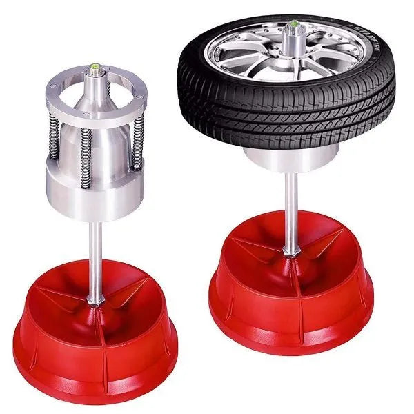 Portable aluminium hub tyre balancer with bull's eye level on enamel base.