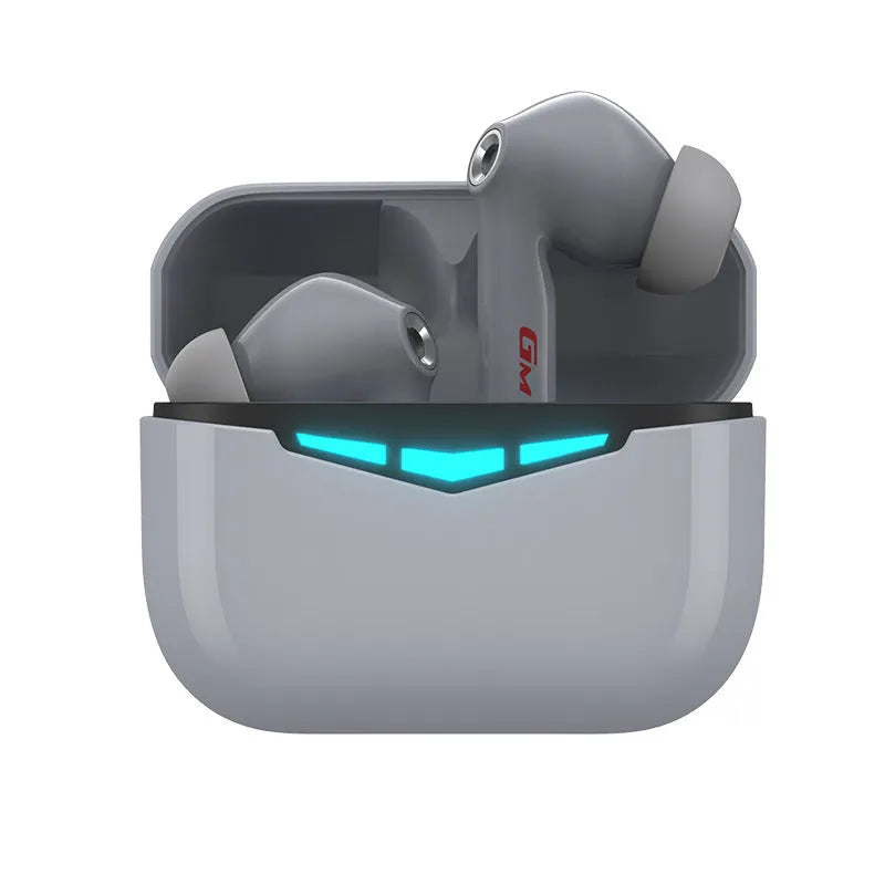 True wireless black in-ear gaming headphones with a white charging case and spare ear tips
