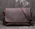 Brown vintage leather men's messenger bag with a flap opening and an adjustable shoulder strap.