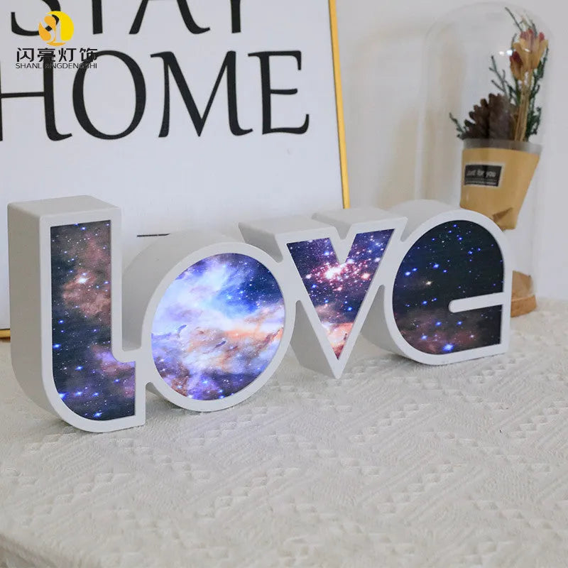 Rainbow style LED LOVE light decoration with plastic shell measuring 35.5cm by 13.5cm