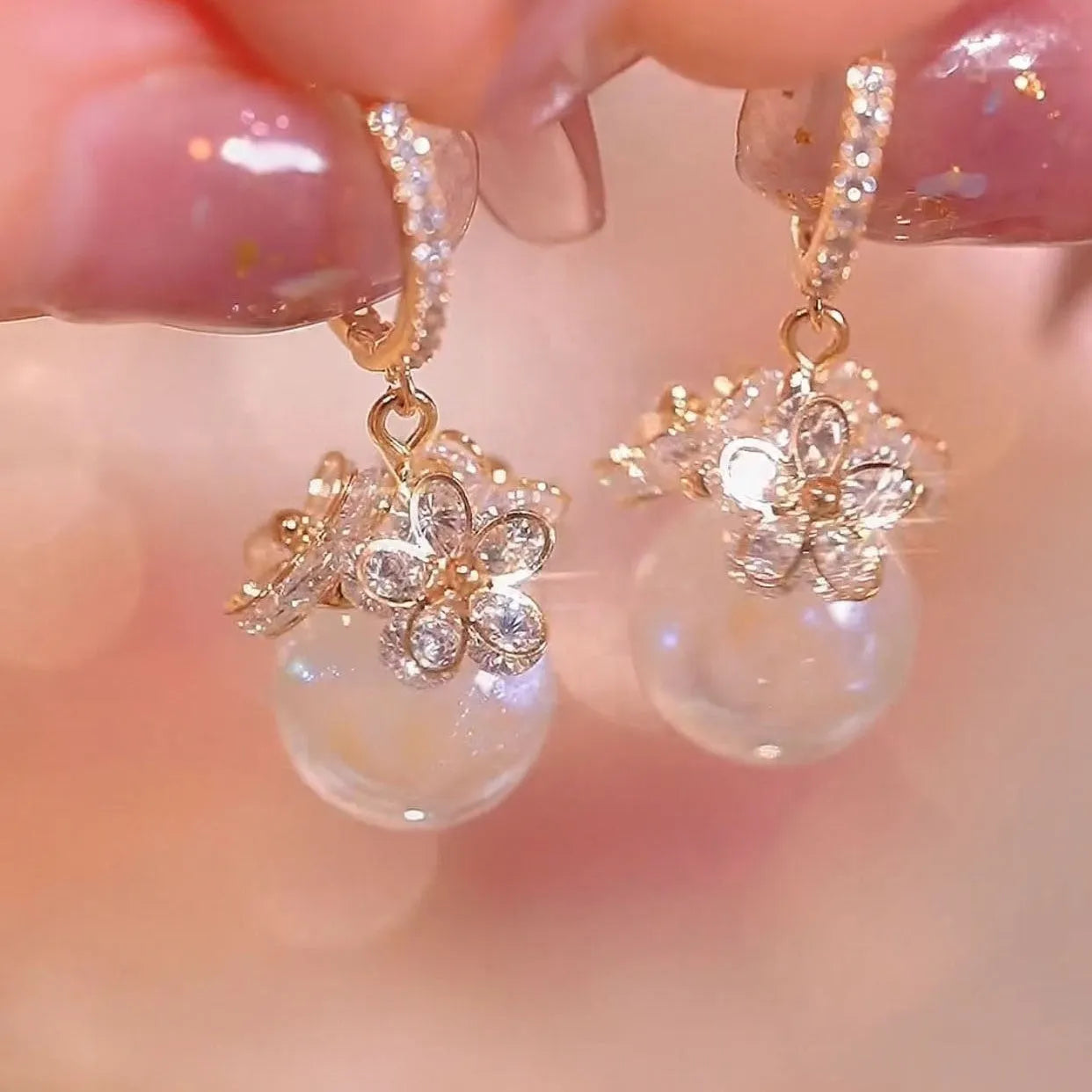 Women's zircon earrings with electroplated finish in geometric rose designs on copper
