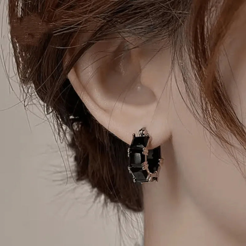Geometric U-shaped women's earrings with round zircon elements and gold electroplated finish