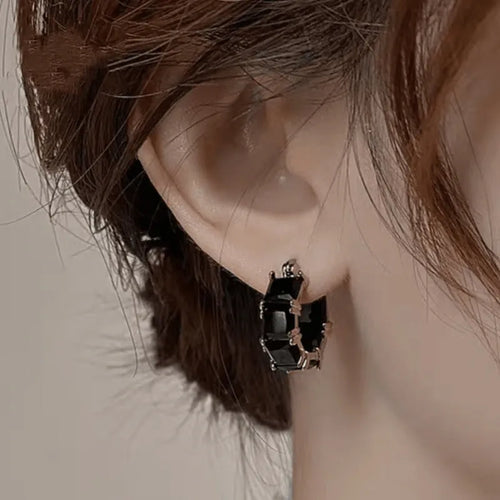 Geometric U-shaped women's earrings with round zircon elements and gold electroplated finish