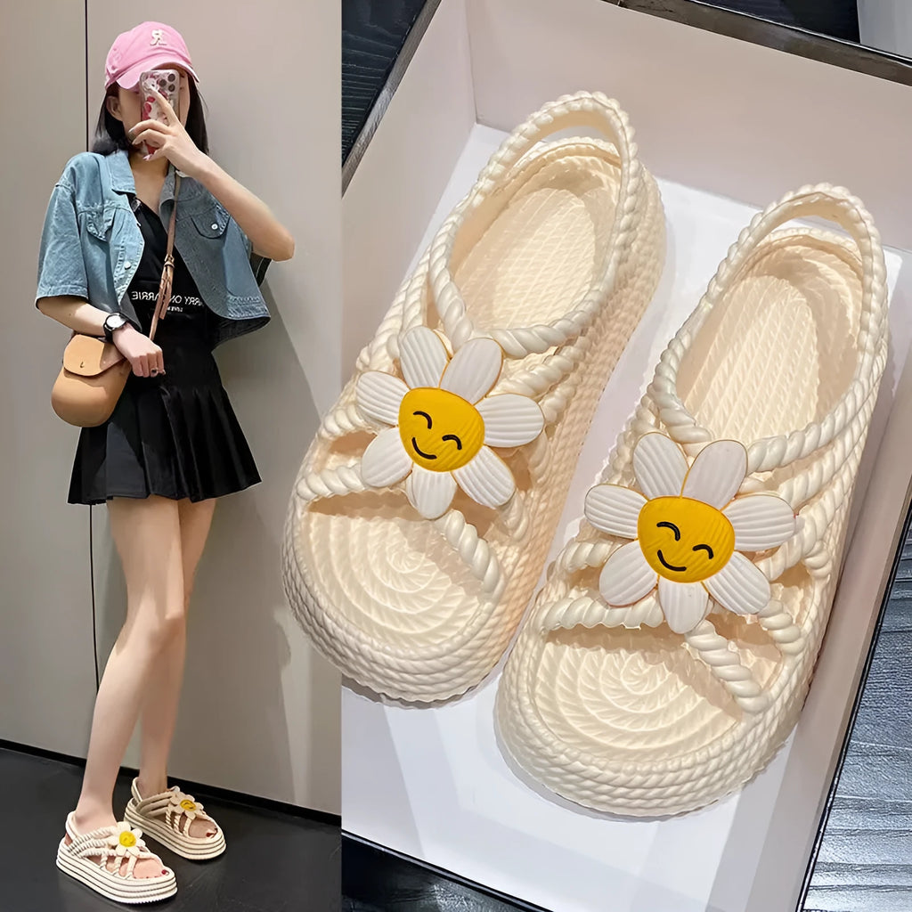 Women's floral decorated PVC sandals in beige or black with non-slip soles