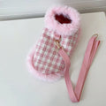 Pink polyester cat cloak with attached rope and matching beret for winter wear.