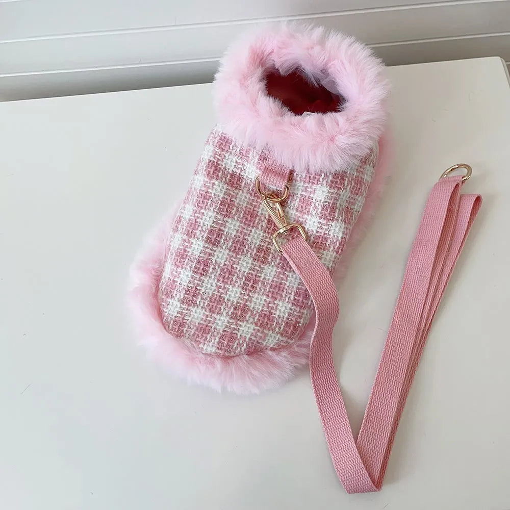 Pink polyester cat cloak with attached rope and matching beret for winter wear.