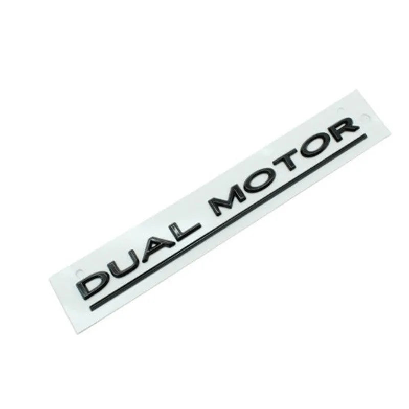 Tesla Model 3 black and red ABS plastic bumper sticker measuring 19cm by 3cm.