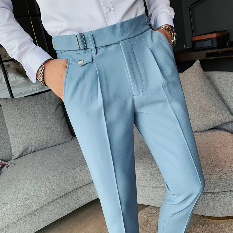 Straight-leg casual trousers in solid colours including black, grey, and khaki on a neutral background.