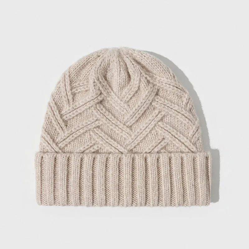 Women's wool knitted dome winter hat with a textured totem pattern.