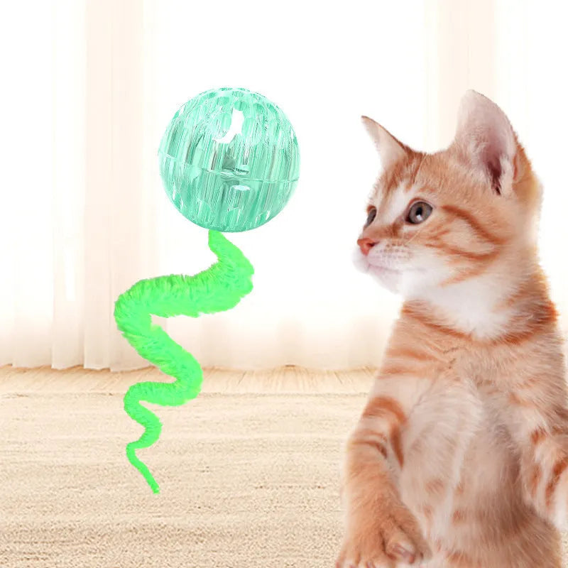 Interactive cat ball toy with worm-like plush tail in green, pink or purple colours
