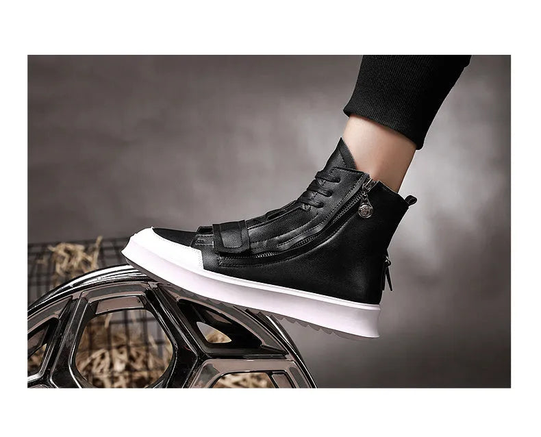 Man wearing black PU leather high-top sneaker style winter ankle boots.