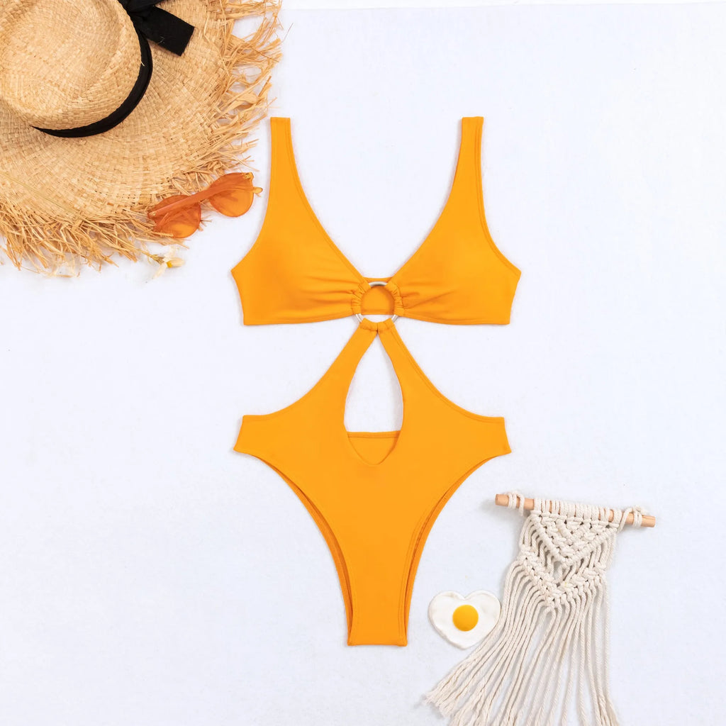 Women's black triangle top one-piece swimsuit laid flat, showing sleeveless design and nylon fabric.