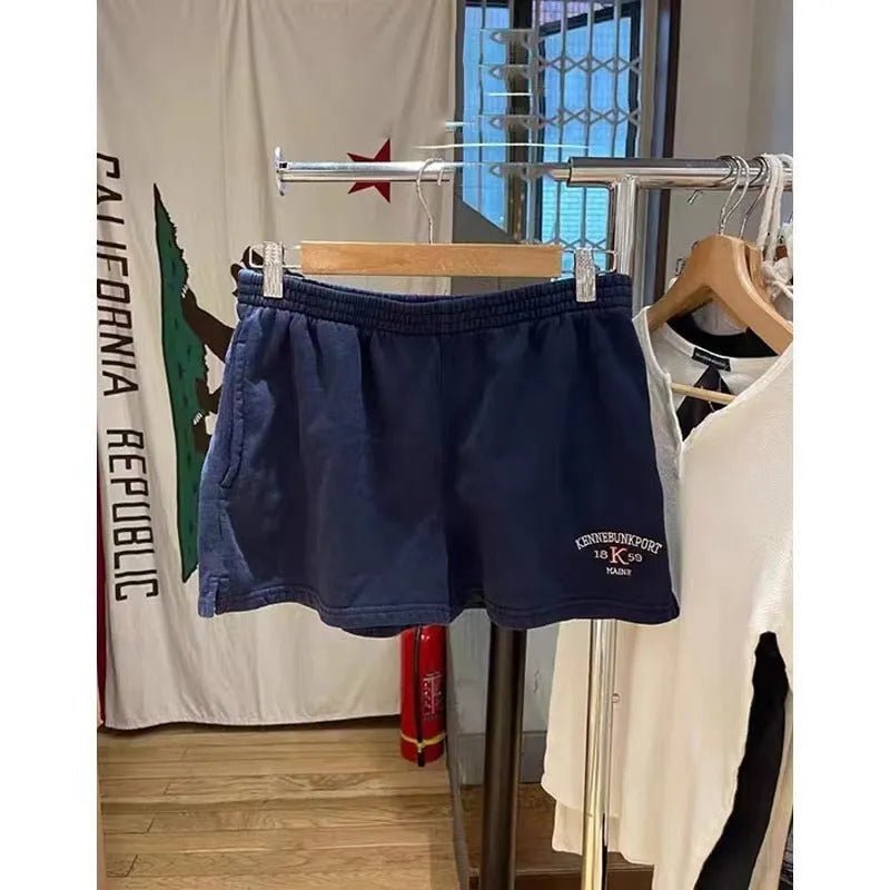 Women's dark blue cotton sports shorts with embroidered white flag design and free size fitting