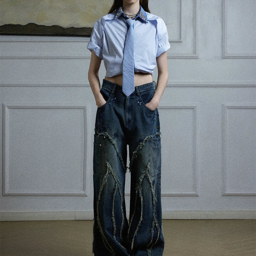 Men's blue loose fit diamond tie patchwork striped shirt with flip collar and button decorations.