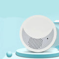 White noise sleep instrument with volume knob and multiple sound options in compact packaging
