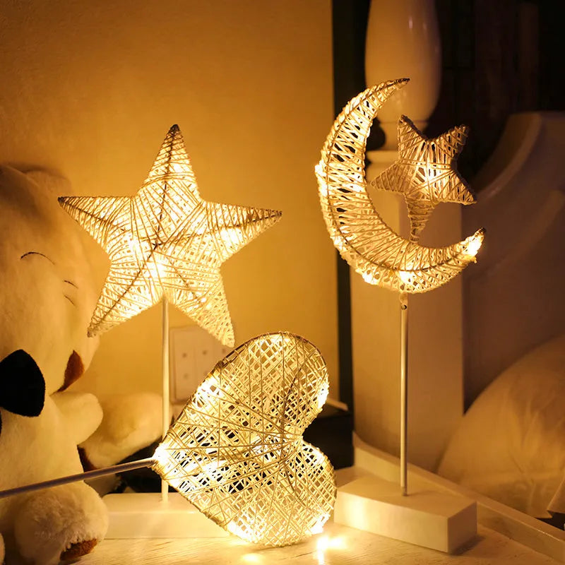 LED string lights with star, heart and moon shapes made from rattan and copper wire for bedroom decoration