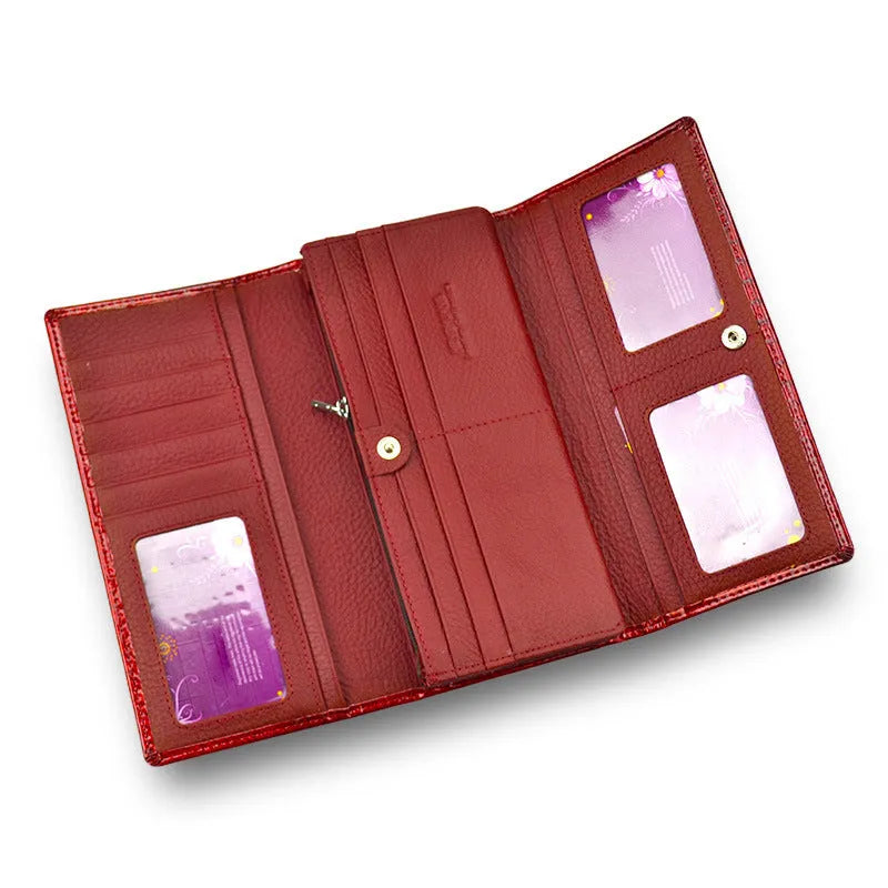 Women's leather coin purse with crocodile pattern texture in red colour showing pigskin lining