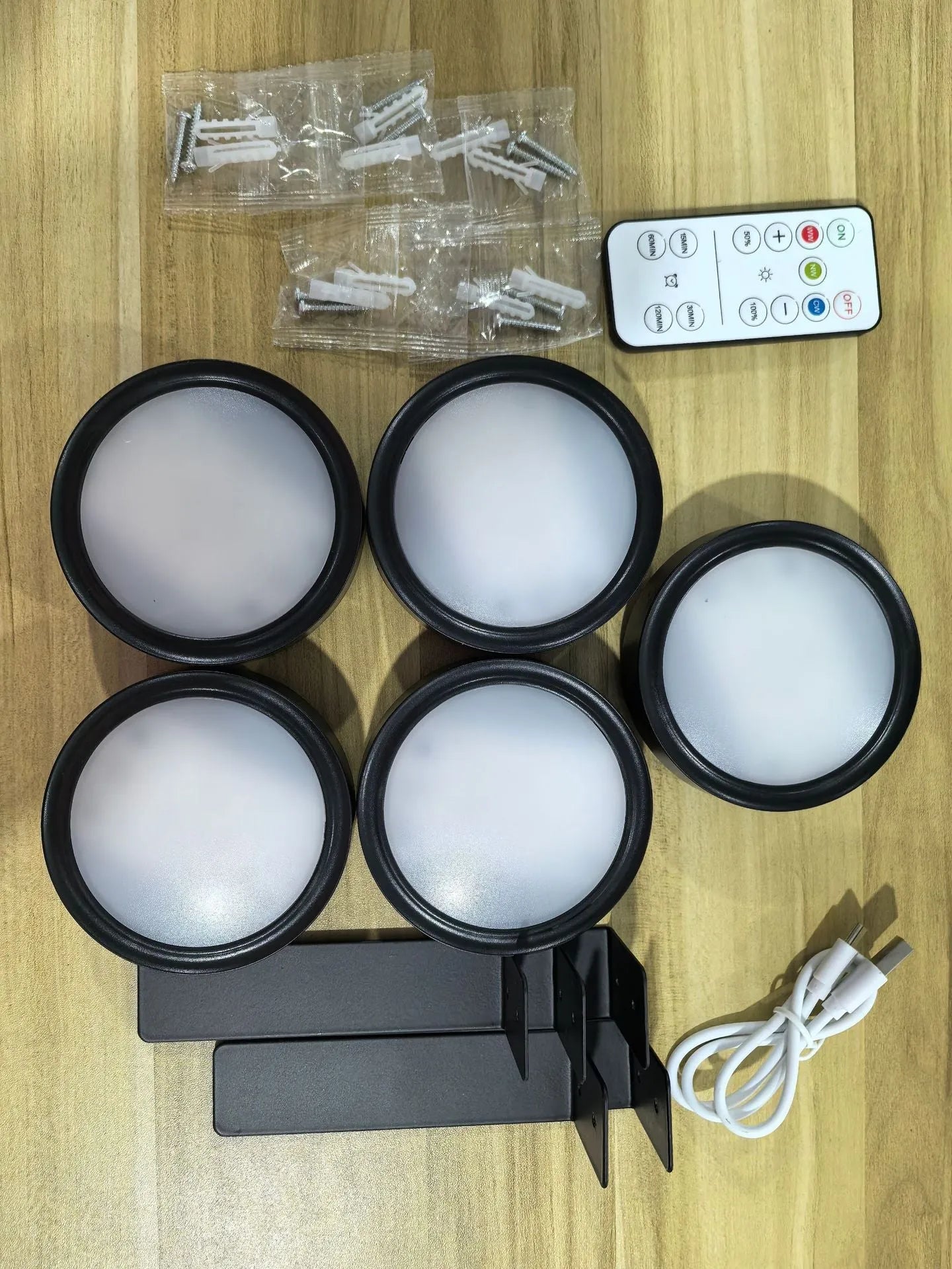 Wireless LED painting lamp with magnetic charging and remote control in black, white or gold finish