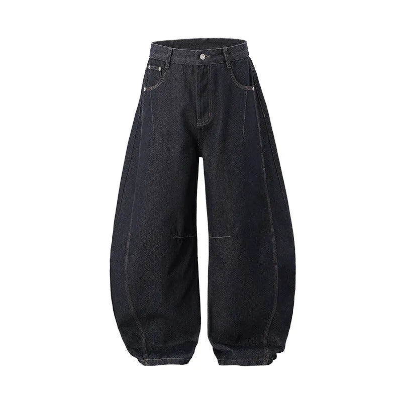 Men's original cow colour wide leg denim trousers with a mid-waist, laid flat.