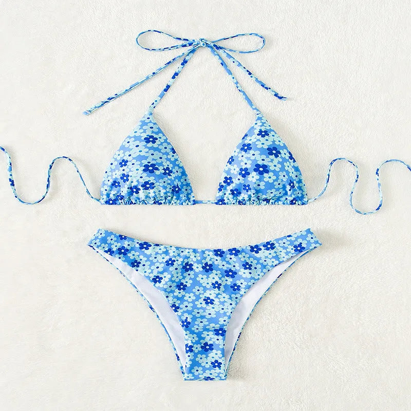 Women's blue printed lace-up swimsuit with sleeveless top and matching shorts