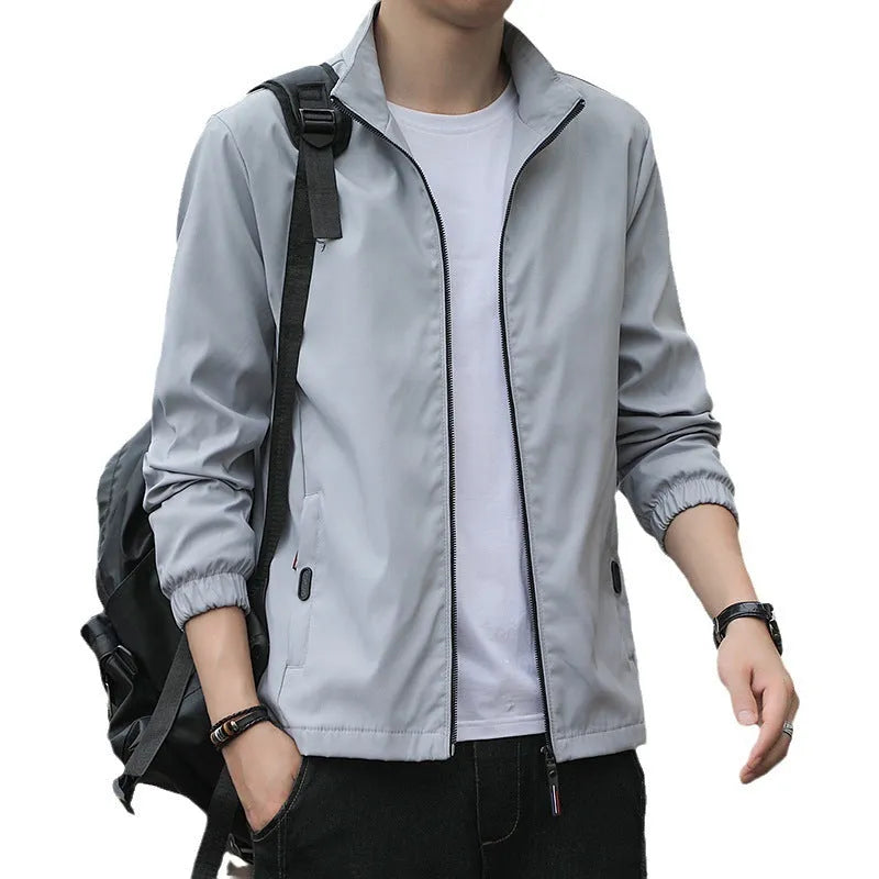 Men's Korean style loose lapel autumn jacket in black with zipper pockets