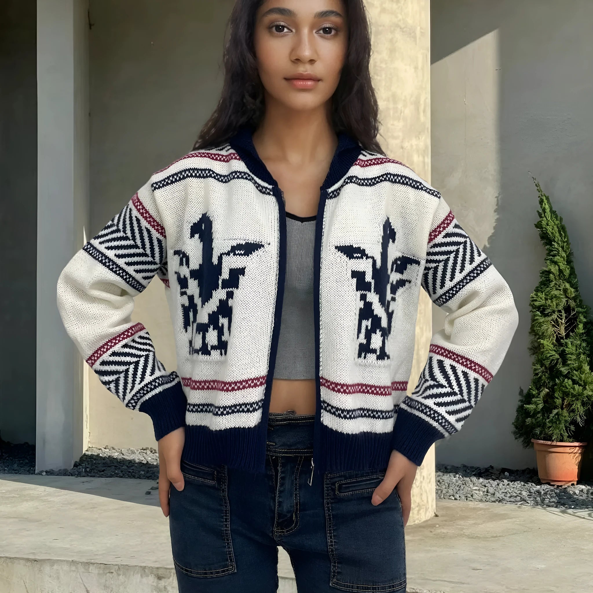White women's zip cardigan with contrasting jacquard stripe pattern and a lapel collar.