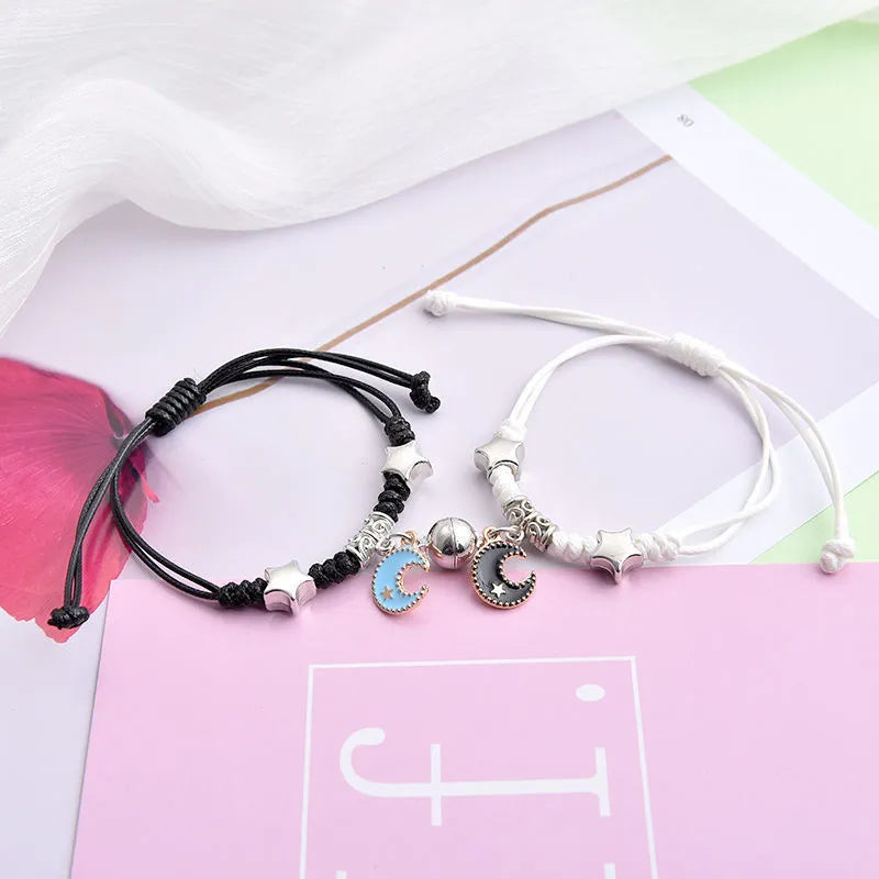 Magnetic couple bracelets with crown design and electroplating finish