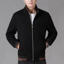 A grey men's sporty fleece jacket with long sleeves and a stick pocket, shown on a hanger.