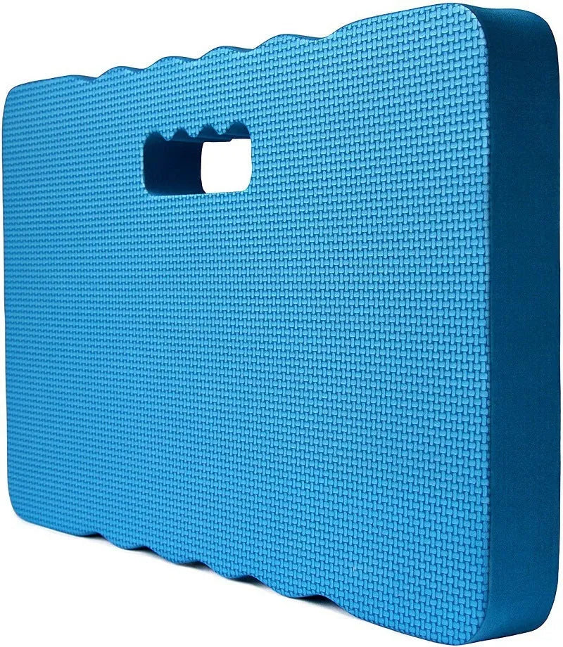 Blue EVA foam garden kneeler pad with handle on grass, dimensions 45cm by 28cm.