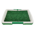 Green three-layer indoor dog toilet tray for puppy potty training with artificial grass